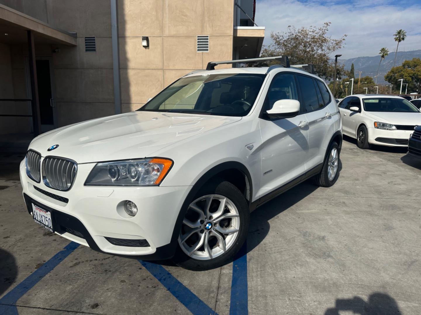 2013 WHITE BMW X3 xDrive28i (5UXWX9C52D0) with an 3.0L L6 DOHC 24V engine, 8-Speed Automatic transmission, located at 30 S. Berkeley Avenue, Pasadena, CA, 91107, (626) 248-7567, 34.145447, -118.109398 - Crown City Motors is a used “Buy Here Pay Here” car dealer in Pasadena CA. “Buy Here Pay Here” financing, means that when you purchase your vehicle from our dealership, that you make the payments to the dealership as well. We do not need the banks approval to get you approved for a used auto - Photo#7